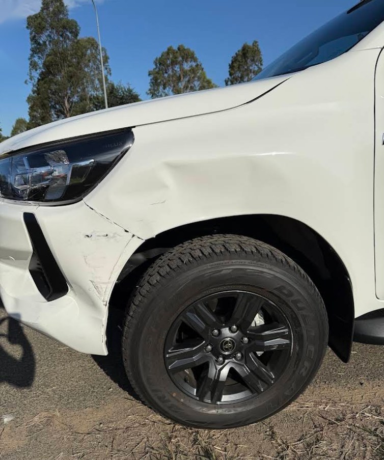 Toyota Hilux front guard with collision damage before repair